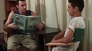 After geography lesson, teacher gives blowjob and ass fucks to cute brunette gay